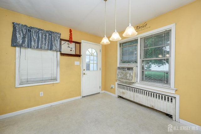 4 Ashwood Pl, North Brunswick, NJ 08902 - entrance foyer featuring radiator and baseboards
