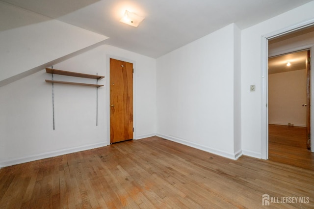 4 Ashwood Pl, North Brunswick, NJ 08902 - bonus room with hardwood / wood-style floors and baseboards