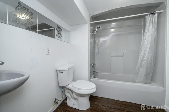 4 Ashwood Pl, North Brunswick, NJ 08902 - bathroom with shower / bathtub combination with curtain, wood finished floors, toilet, and a sink