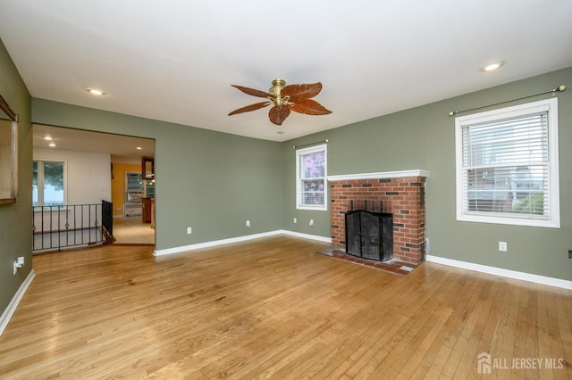 4 Ashwood Pl, North Brunswick, NJ 08902 - unfurnished living room with light wood-type flooring, ceiling fan, plenty of natural light, baseboards, and recessed lighting