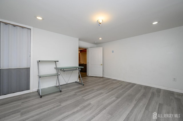 4 Ashwood Pl, North Brunswick, NJ 08902 - spare room with wood finished floors, recessed lighting, and baseboards