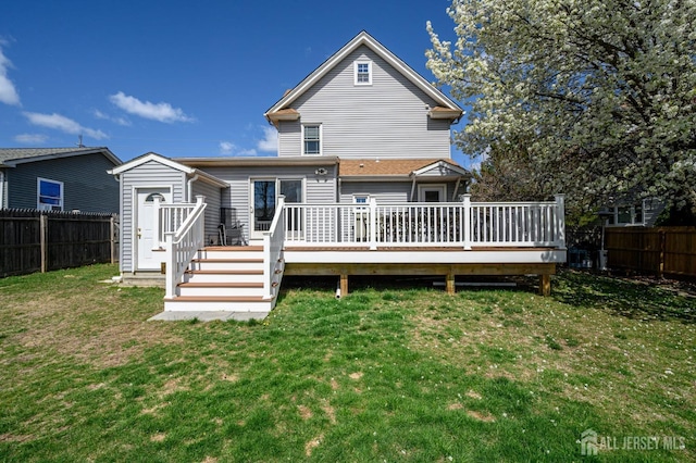 47 Lincoln Ave, Jamesburg, NJ 08831 - rear view of property featuring a yard, a fenced backyard, and a wooden deck