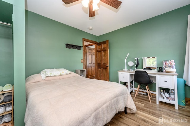 47 Lincoln Ave, Jamesburg, NJ 08831 - bedroom with wood finished floors and a ceiling fan