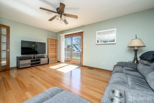 47 Lincoln Ave, Jamesburg, NJ 08831 - living room with light wood-style flooring, baseboards, and a ceiling fan