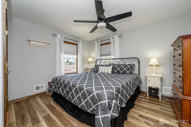 47 Lincoln Ave, Jamesburg, NJ 08831 - bedroom with ceiling fan, visible vents, baseboards, and wood finished floors