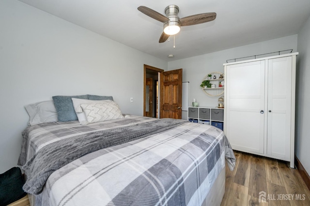 47 Lincoln Ave, Jamesburg, NJ 08831 - bedroom featuring wood finished floors, a closet, and a ceiling fan