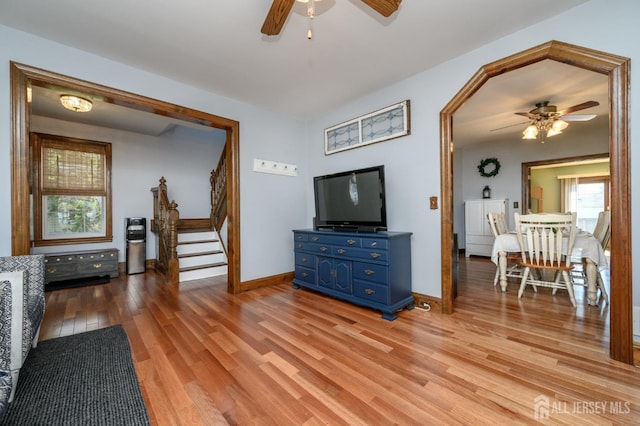 47 Lincoln Ave, Jamesburg, NJ 08831 - living area with light wood finished floors, ceiling fan, baseboards, and stairs