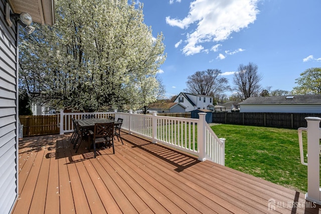 47 Lincoln Ave, Jamesburg, NJ 08831 - wooden terrace with a yard, a storage shed, a fenced backyard, an outdoor structure, and outdoor dining area