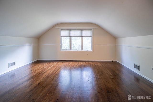 33 Timber Rd, Edison, NJ 08820 - additional living space with wood finished floors and vaulted ceiling