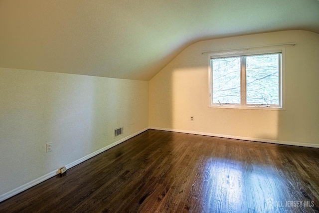 33 Timber Rd, Edison, NJ 08820 - bonus room with vaulted ceiling and dark wood-type flooring