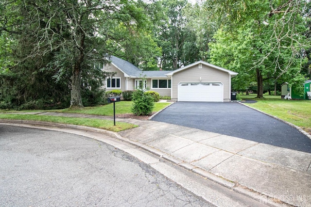 33 Timber Rd, Edison, NJ 08820 - ranch-style home featuring an attached garage, asphalt driveway, and a front yard