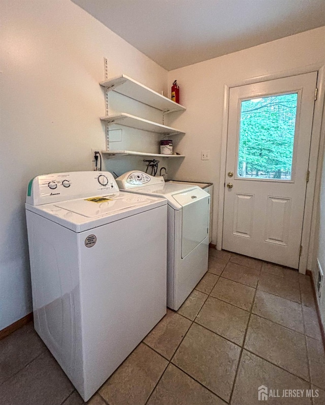 33 Timber Rd, Edison, NJ 08820 - laundry area featuring washer and clothes dryer and light tile patterned floors