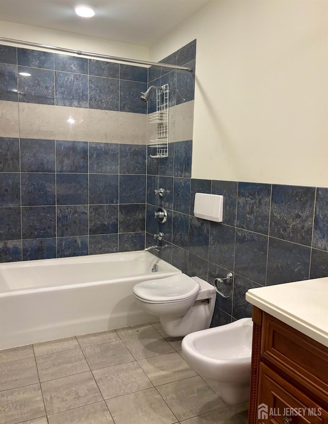 33 Timber Rd, Edison, NJ 08820 - full bath featuring tile walls, shower / bathtub combination, vanity, tile patterned floors, and a bidet