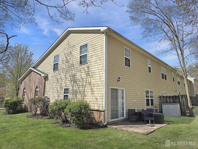 9 William Martin Way, Flemington, NJ 08822 - rear view of property featuring a patio area and brick siding