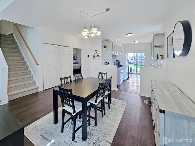 9 William Martin Way, Flemington, NJ 08822 - dining room with stairs, dark wood finished floors, a chandelier, and baseboards