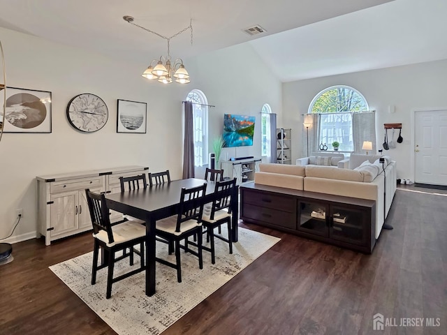 9 William Martin Way, Flemington, NJ 08822 - dining room with vaulted ceiling, a chandelier, dark wood-style flooring, and baseboards