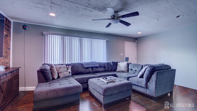 living area with recessed lighting, a textured ceiling, dark wood-style floors, and a ceiling fan