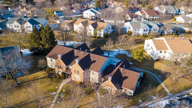 birds eye view of property with a residential view