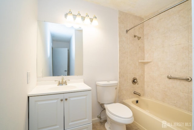 full bathroom featuring vanity, shower / tub combination, and toilet