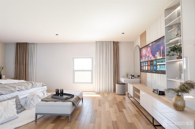 bedroom with light wood-style floors