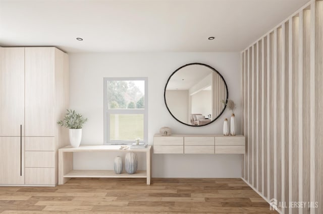 full bathroom featuring vanity, recessed lighting, wood finished floors, and a bathtub