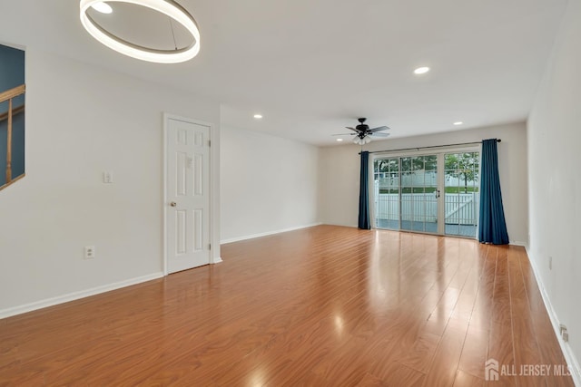 26 Desoto Dr, Franklin Twsp, NJ 08823 - empty room with ceiling fan, wood finished floors, and recessed lighting