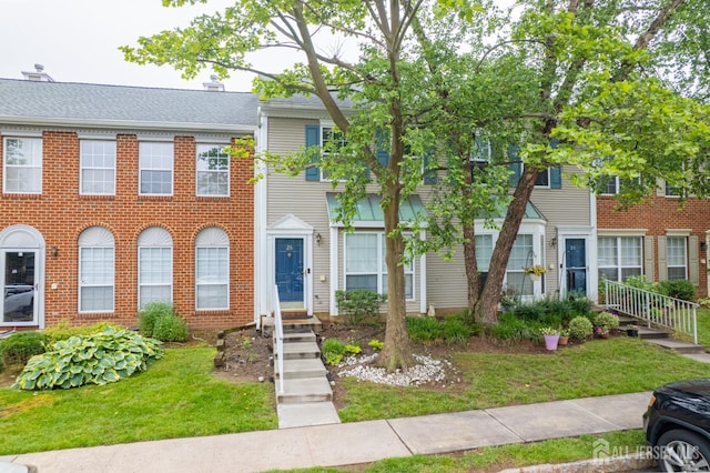 26 Desoto Dr, Franklin Twsp, NJ 08823 - townhome / multi-family property featuring a front lawn