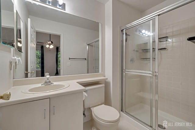 26 Desoto Dr, Franklin Twsp, NJ 08823 - bathroom featuring an enclosed shower, vanity, and a ceiling fan