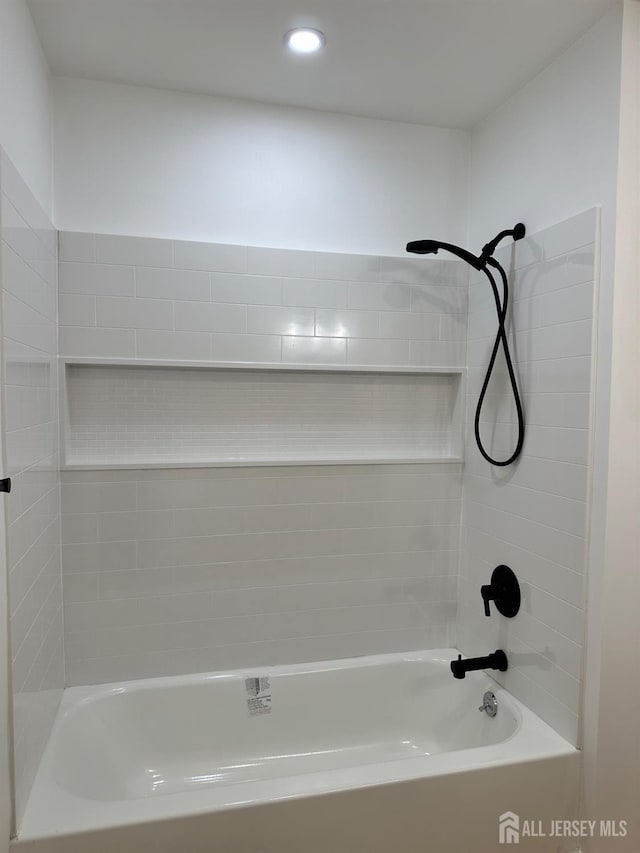 full bath featuring shower / washtub combination