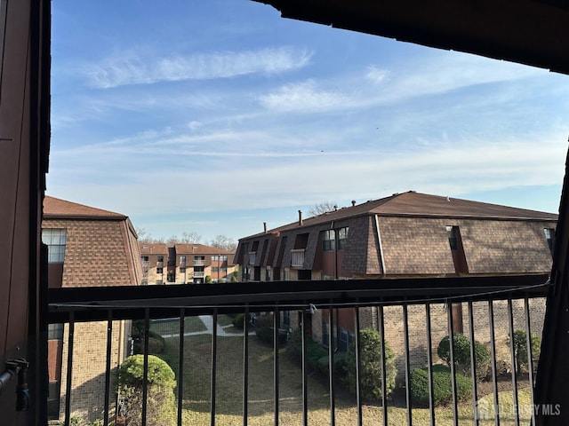 balcony featuring a residential view