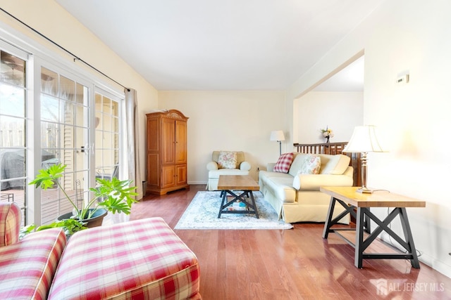 135 Archery Ct, Old Bridge, NJ 08857 - living area featuring baseboards and wood finished floors