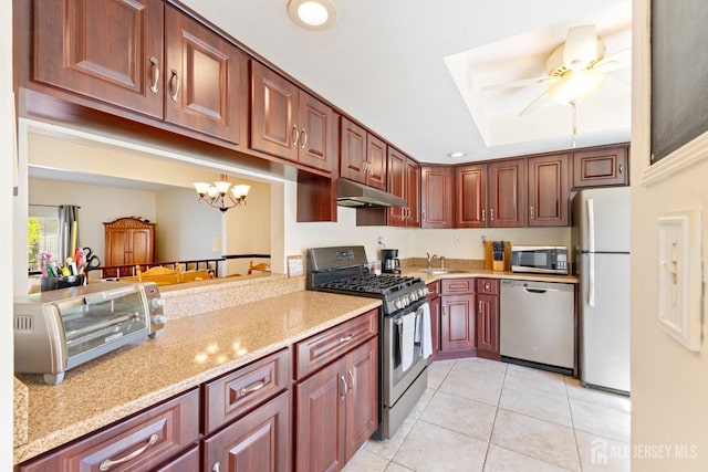 135 Archery Ct, Old Bridge, NJ 08857 - kitchen featuring a toaster, under cabinet range hood, a sink, light tile patterned floors, and stainless steel appliances