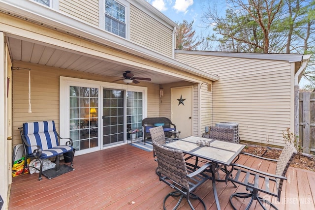 135 Archery Ct, Old Bridge, NJ 08857 - wooden terrace featuring outdoor dining area, a ceiling fan, central air condition unit, and fence