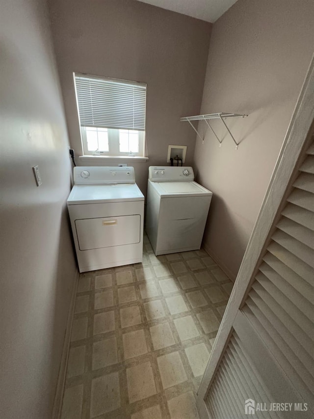 laundry area featuring washer and clothes dryer