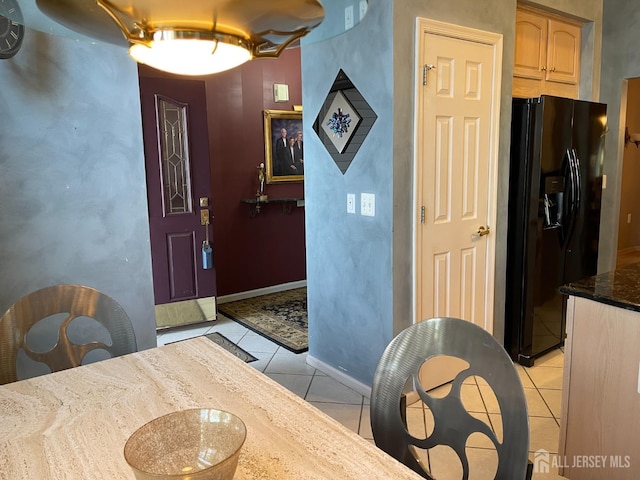 interior space featuring light tile patterned flooring