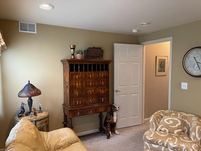 living area with carpet flooring