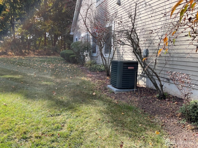 view of yard featuring central AC unit