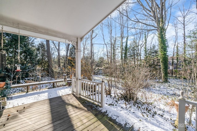 view of snow covered deck