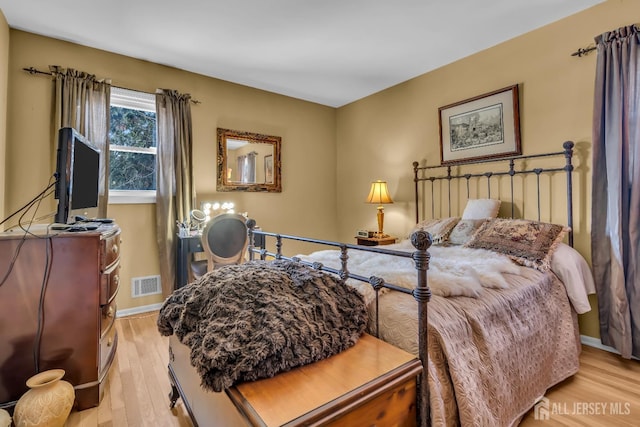 bedroom featuring light hardwood / wood-style flooring