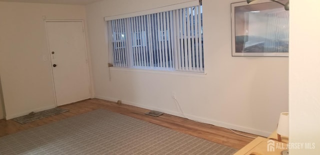 57 Judson St Unit 6A, Edison, NJ 08837 - spare room featuring wood finished floors and baseboards
