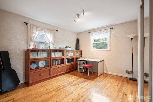 14 Bosko Dr, East Brunswick, NJ 08816 - office area featuring plenty of natural light, light wood finished floors, and track lighting