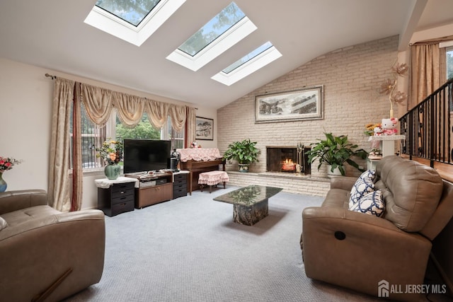 14 Bosko Dr, East Brunswick, NJ 08816 - living area featuring lofted ceiling, a skylight, brick wall, a fireplace, and carpet floors