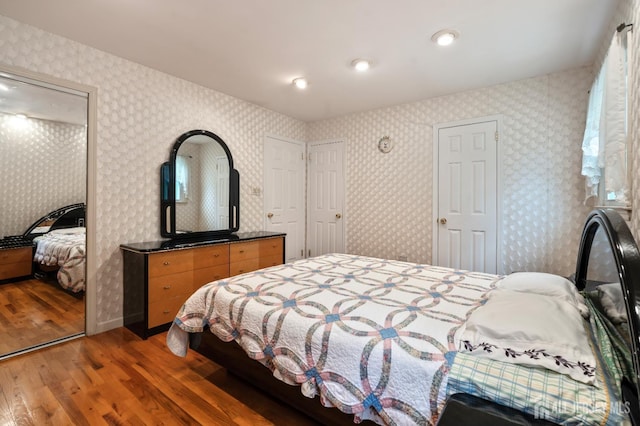 14 Bosko Dr, East Brunswick, NJ 08816 - bedroom with wood finished floors, wallpapered walls, and recessed lighting