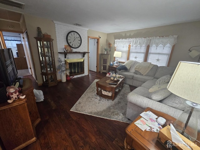 91 Grant Ave, Fords, NJ 08863 - living room featuring wood finished floors and a brick fireplace