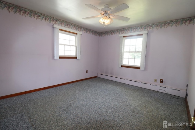 13 Olchaskey Ave, South River, NJ 08882 - unfurnished room featuring a baseboard heating unit, carpet, and ceiling fan