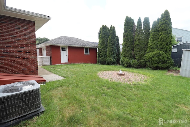 13 Olchaskey Ave, South River, NJ 08882 - view of grassy yard with an outdoor structure