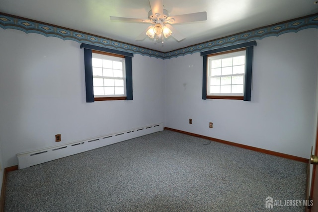 13 Olchaskey Ave, South River, NJ 08882 - carpeted spare room with baseboard heating, healthy amount of natural light, and a ceiling fan