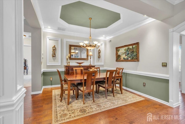 1 Ballybunion Dr, Monroe, NJ 08831 - dining area with wood finished floors, a chandelier, baseboards, and ornamental molding