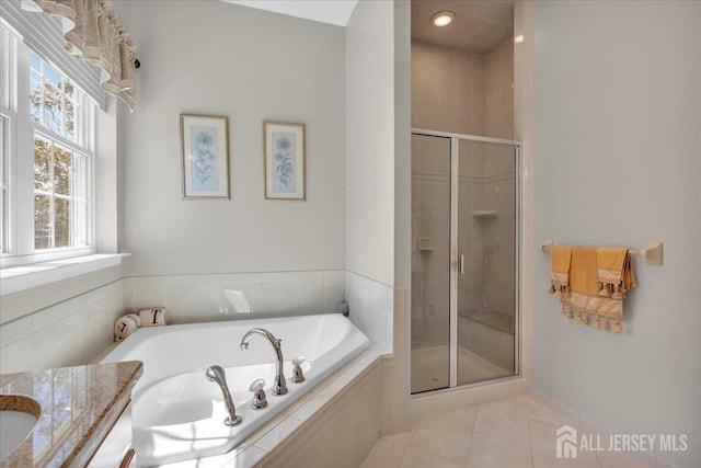 1 Ballybunion Dr, Monroe, NJ 08831 - bathroom featuring a stall shower, tile patterned floors, a bath, and vanity