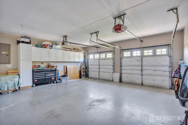 1 Ballybunion Dr, Monroe, NJ 08831 - garage featuring a garage door opener and electric panel